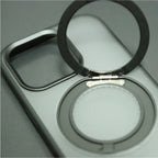 Close-up of a car cup holder with a round mirror attached.