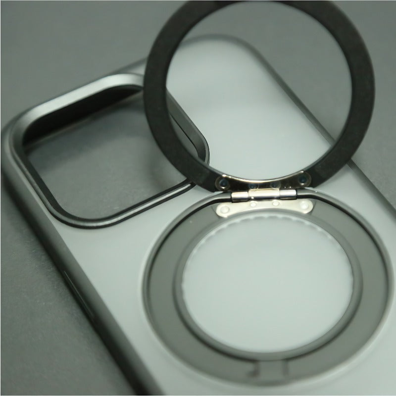 Close-up of a car cup holder with a round mirror attached.
