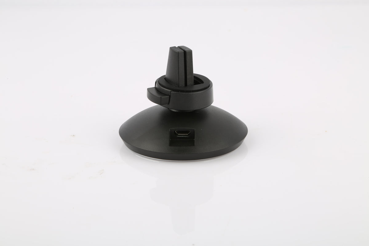 A black plastic car dashboard air vent mount with a suction cup base, shown on a plain white background.
