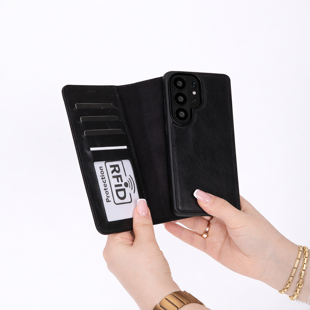 Black phone case with RFID protection label held by a hand on a white background